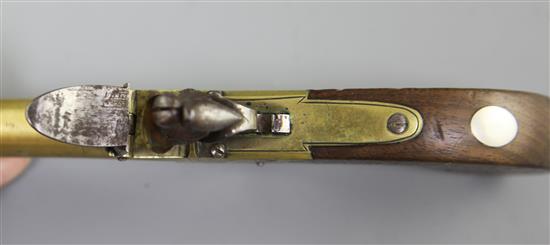 A pair of brass framed and barrelled flintlock boxlock pocket pistols, 8in. (11in with bayonet)